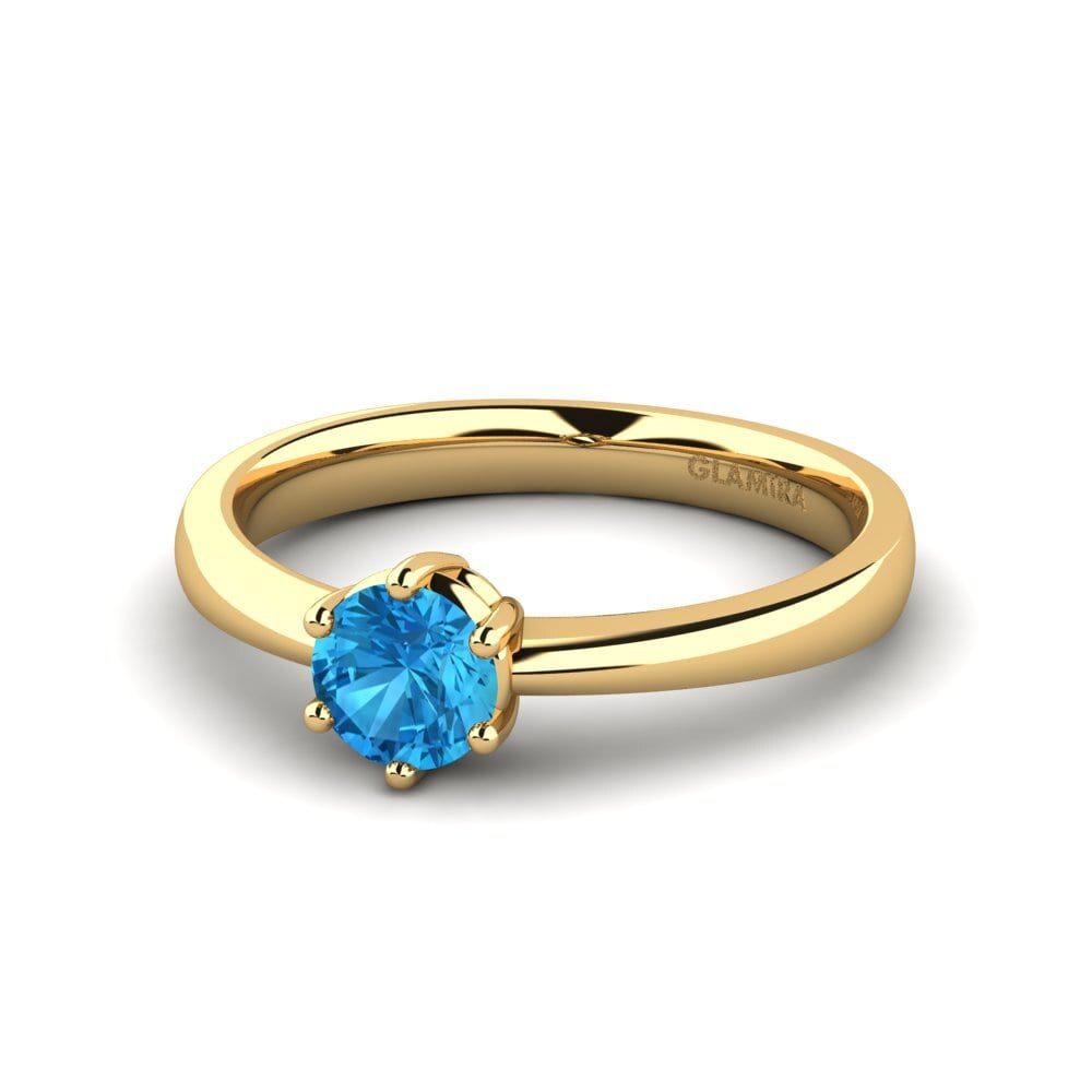 Classic Solitaire Blue Topaz 9ct Yellow Gold Rings