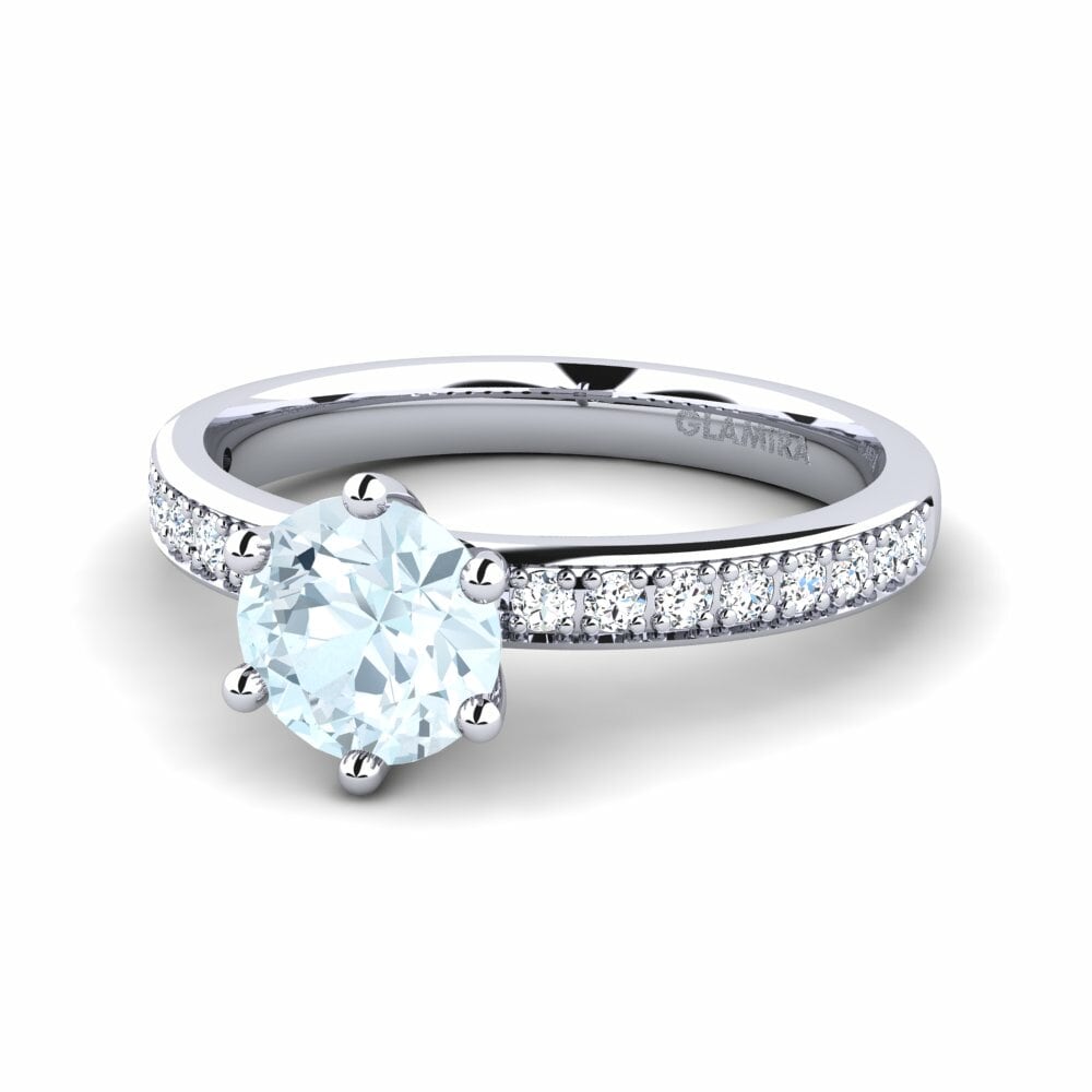 Diamond engagement ring with aquamarine accents top